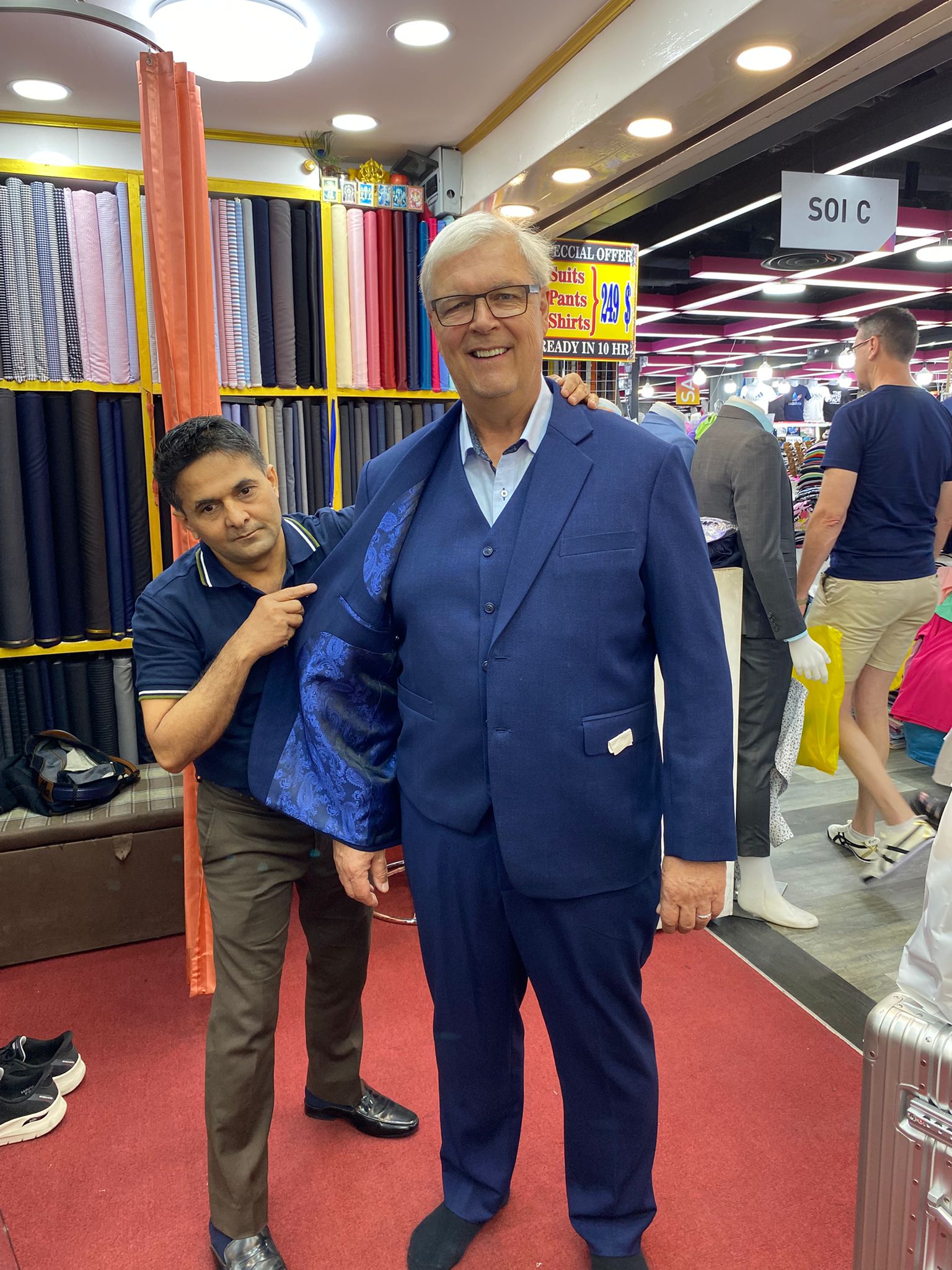 Happy client in custom tailored suit at King Fashion Uni Bangkok